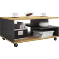 Table basse sur roulettes avec plateau en bois et structure anthracite pour salon